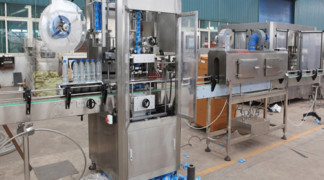 SLEEVE LABELING MACHINE